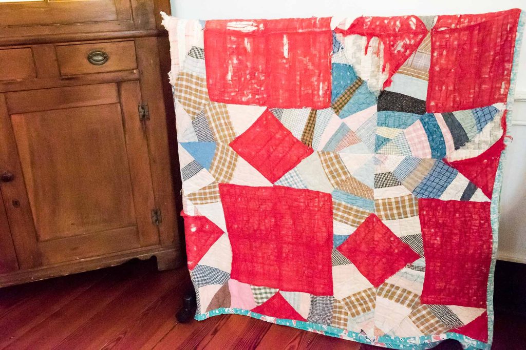 Wear on this Ragland Collection quilt illustrates the everyday usefulness of quilts as cover, in addition to their role as folk art.