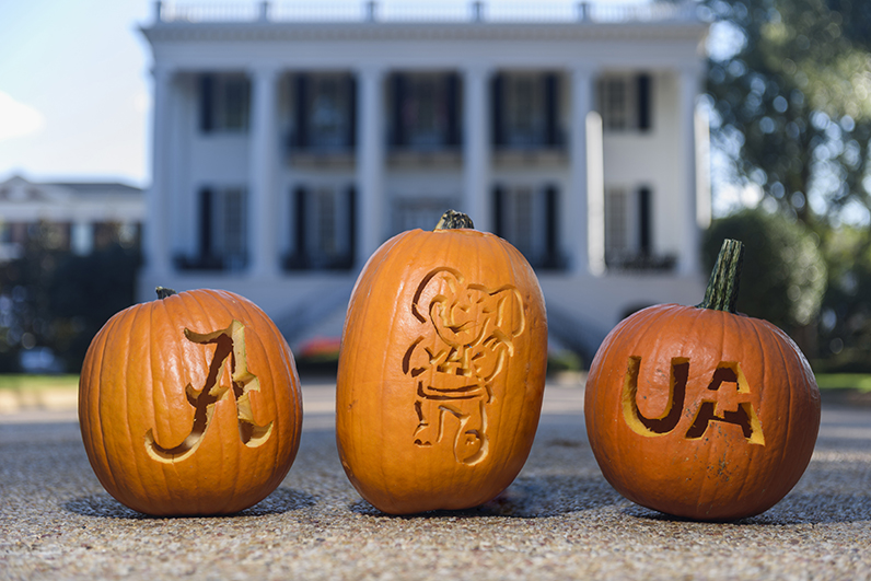 carved pumpkins in front of president's mansion