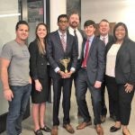 From left to right: Marco Nelson of RentCheck, Jessica Hastings, Sudarsan Murali, Dalton Kerby, Landon Robertson, Spencer Adams, and Laci Williams celebrate their first place victory.