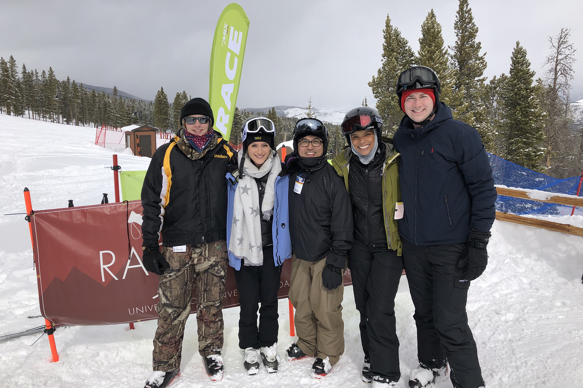 Case team standing on the ski slopes.
