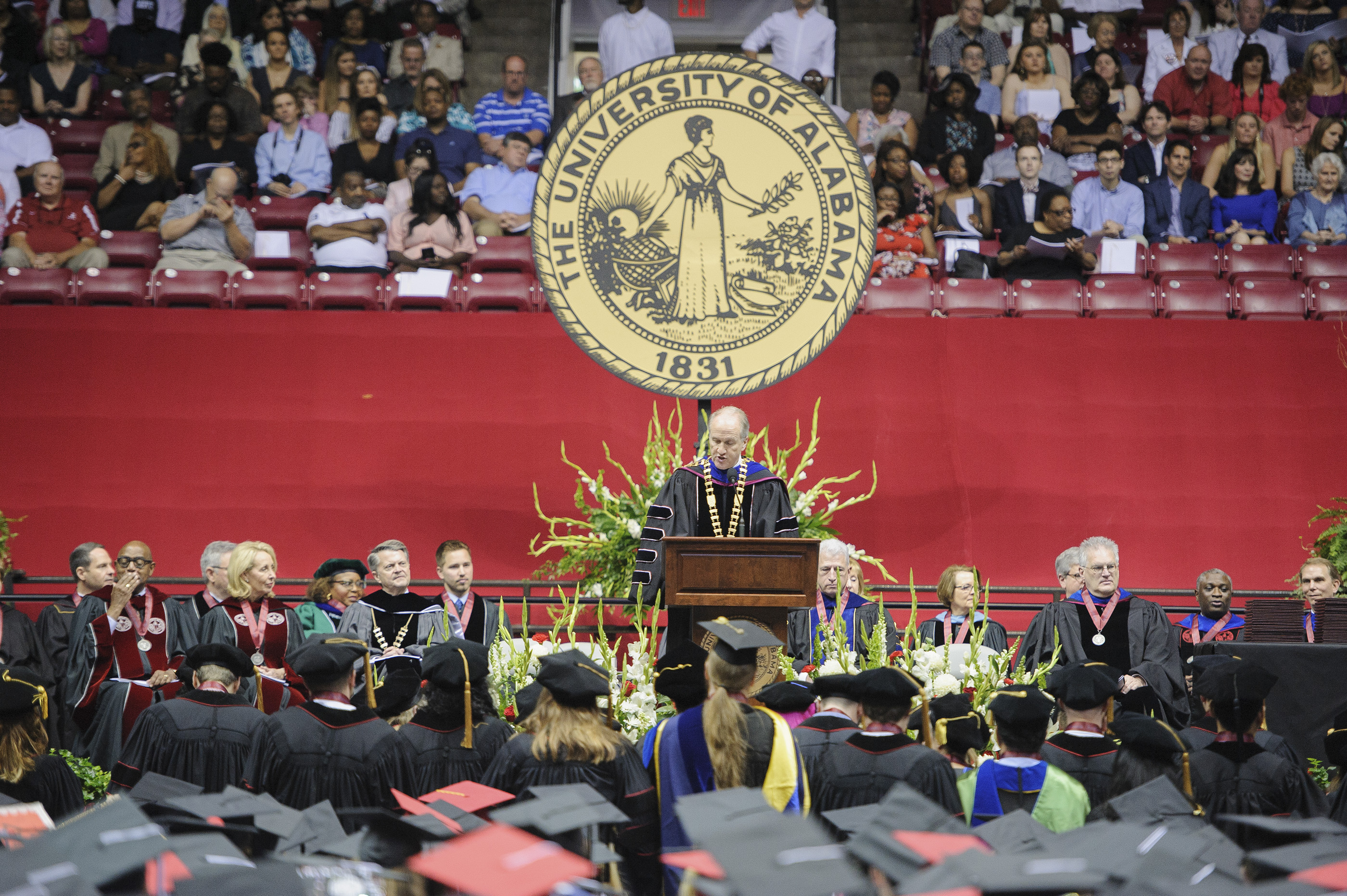 Commencement Ceremony with Dr. Bell at the podium