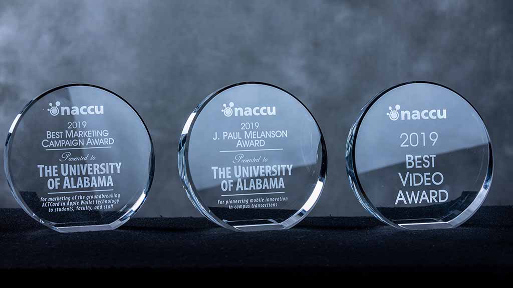 Three awards, glass with etched lettering