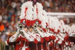 Trumpet players in the Million Dollar Band play during a halftime performance