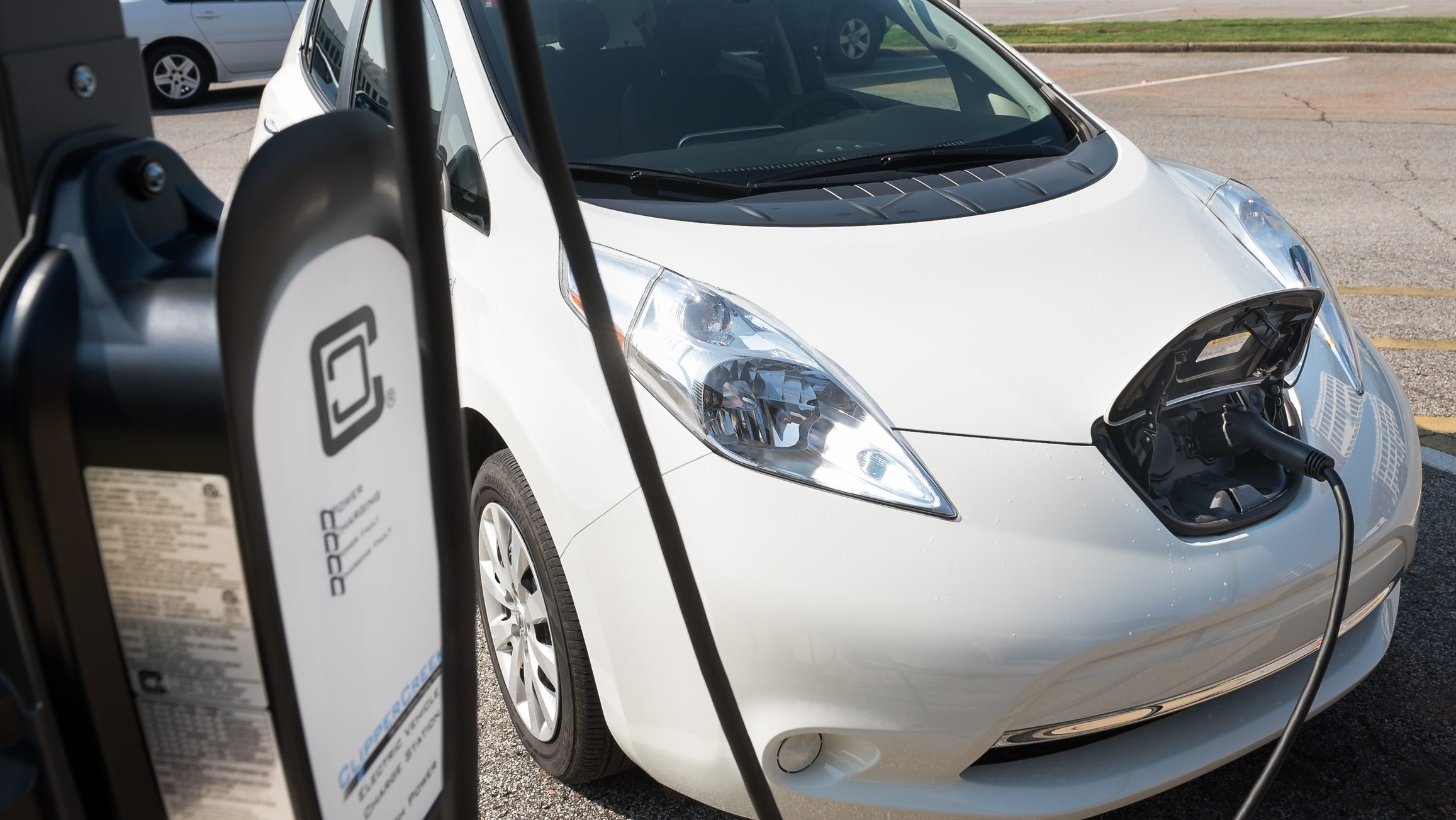 Leaf electric vehicle at various charging stations around campus