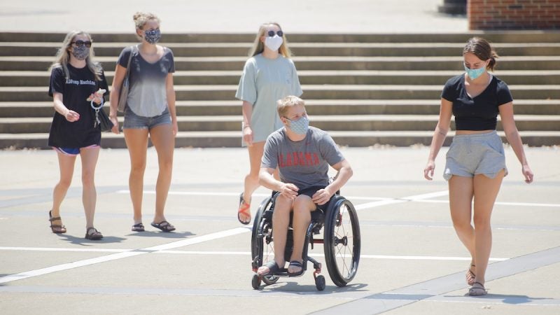 Five students with masks.