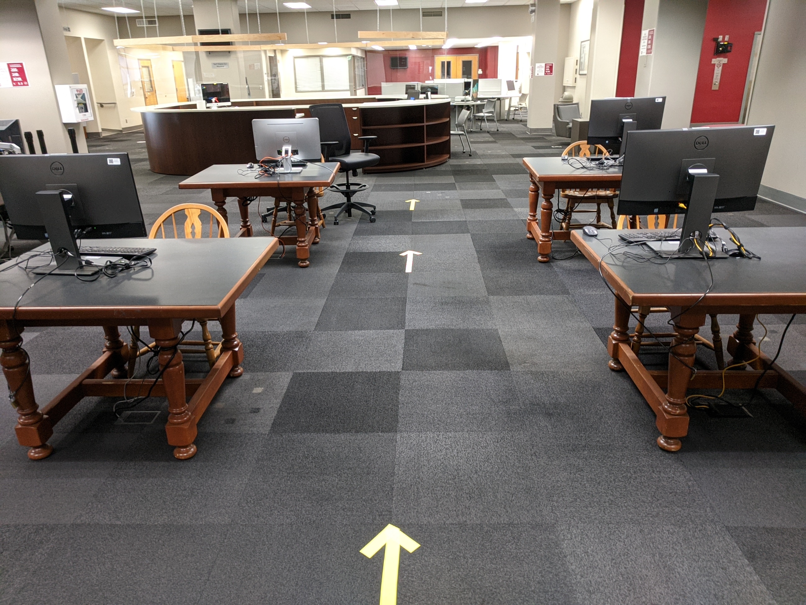 Arrows point out the direction that foot traffic in the libraries should follow