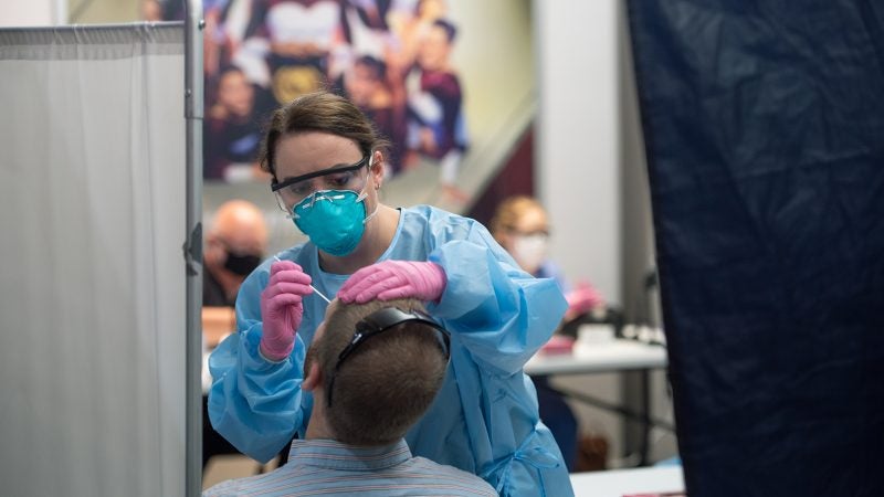A man is being tested for COVID-19.