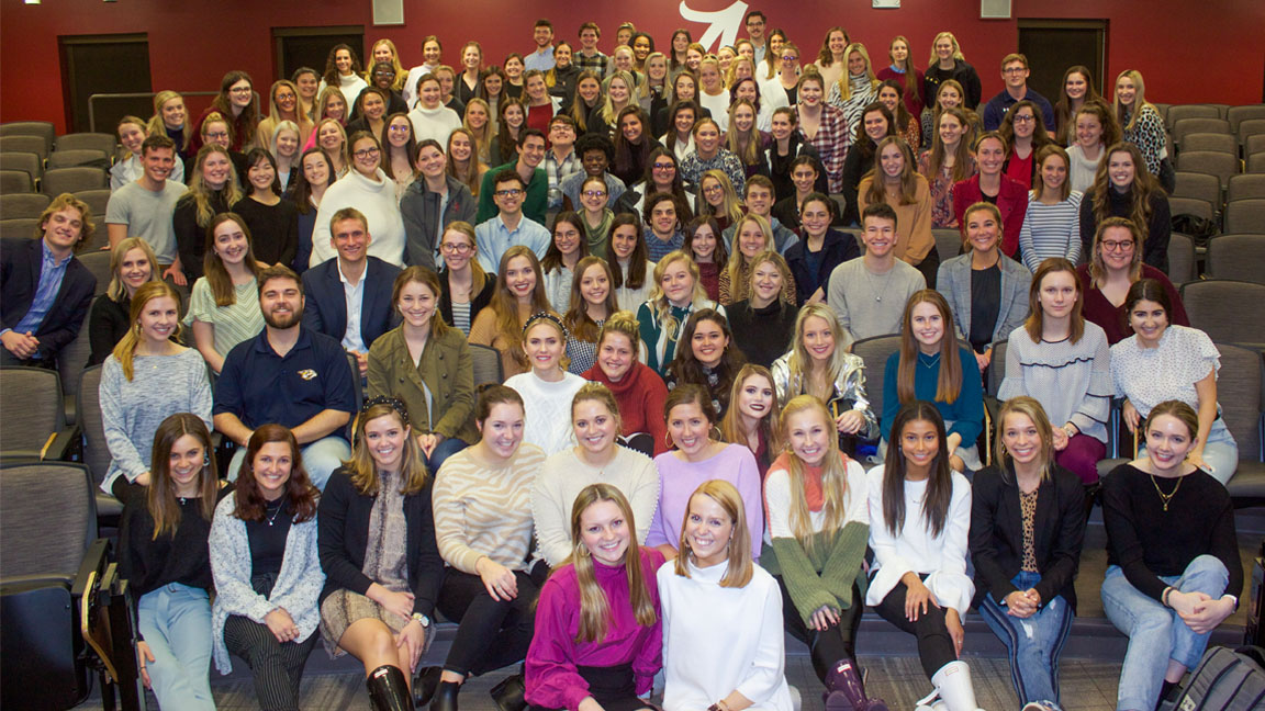 A large group of students who make up the university of alabama PRSSA chapter