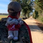 A student marches to Tuscaloosa in the first Operation Iron Ruck.