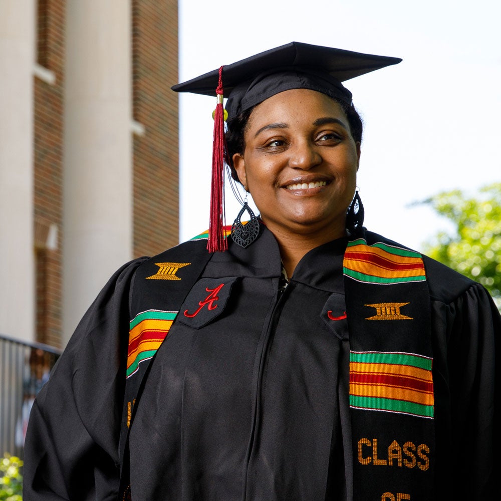 LACrystal Davis in her cap and gown smiling