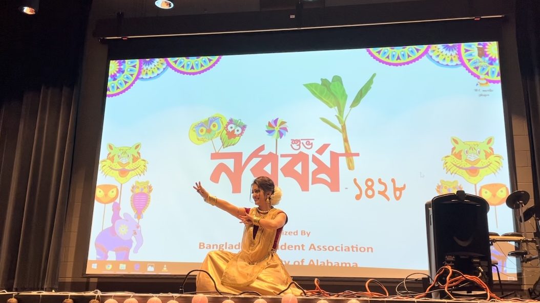 Khadiza Tul Jannat, a communications doctoral student, performs a traditional dance for Bengali New Year Celebration