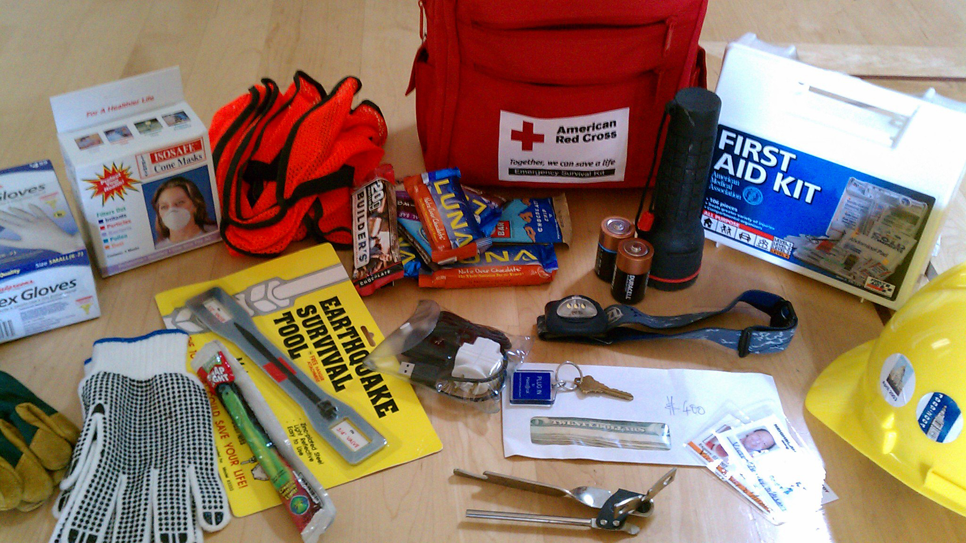 the contents of an emergency kit displayed on a table