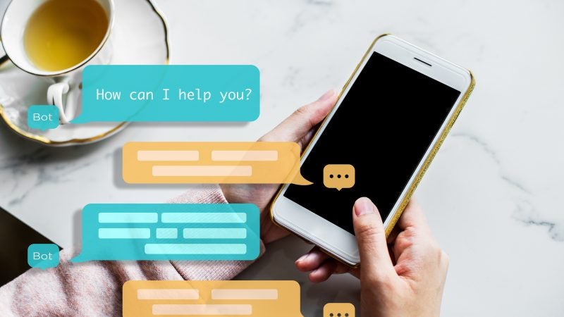 A photo illustration of texts over hands holding a phone.