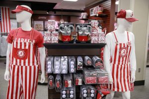 mannequins wearing crimson and white overalls