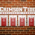 Six plaques celebrating the wheelchair tennis program's national championships
