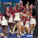 UA's cheerleading team celebrates after it won the 2021 all-girl national championship