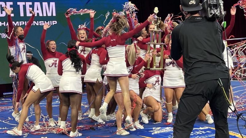 UA's cheerleading team celebrates after it won the 2021 all-girl national championship