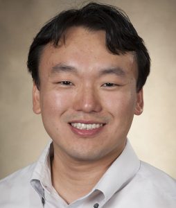 A headshot of John Kim