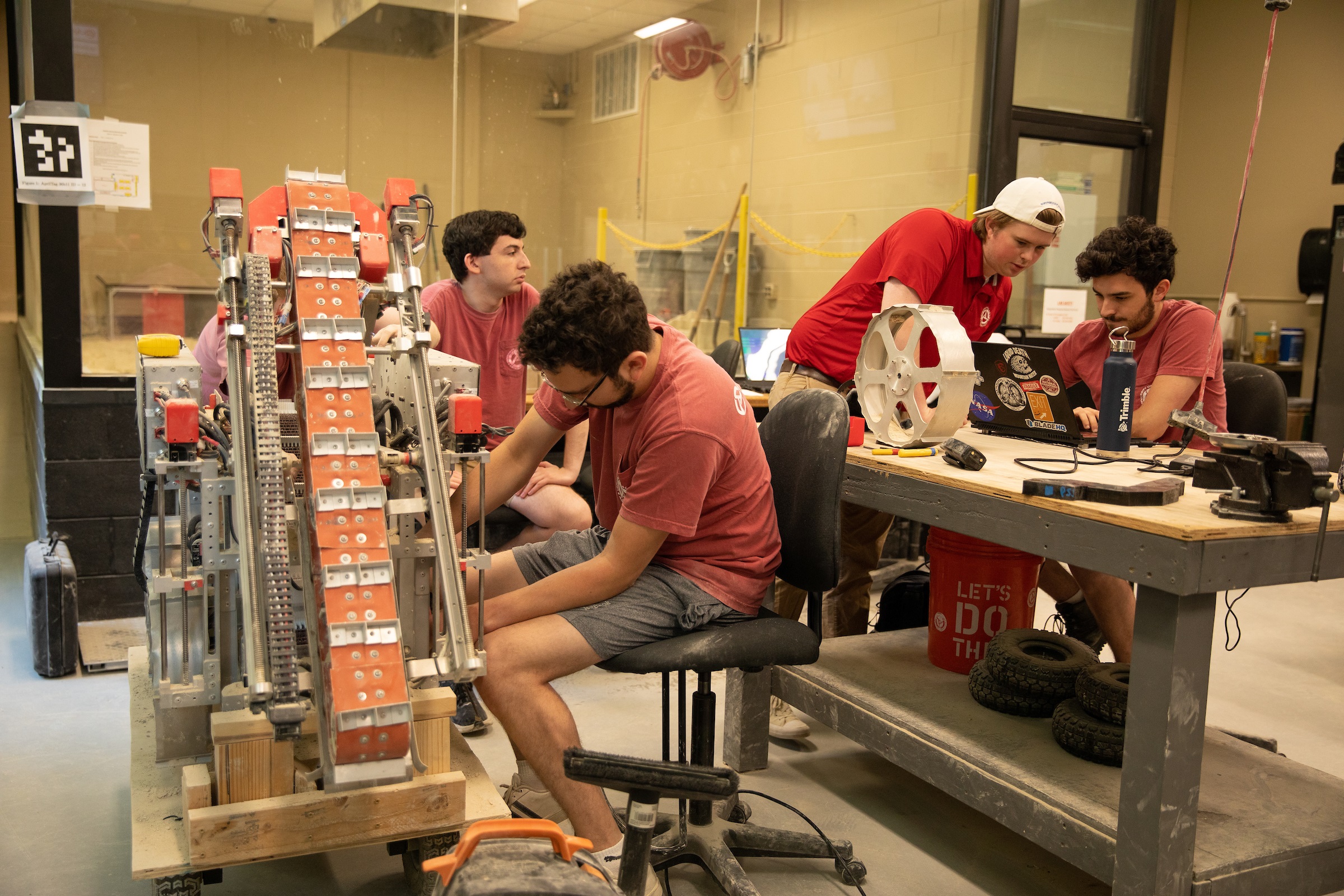 Students at The University of Alabama work in a robotics lab.