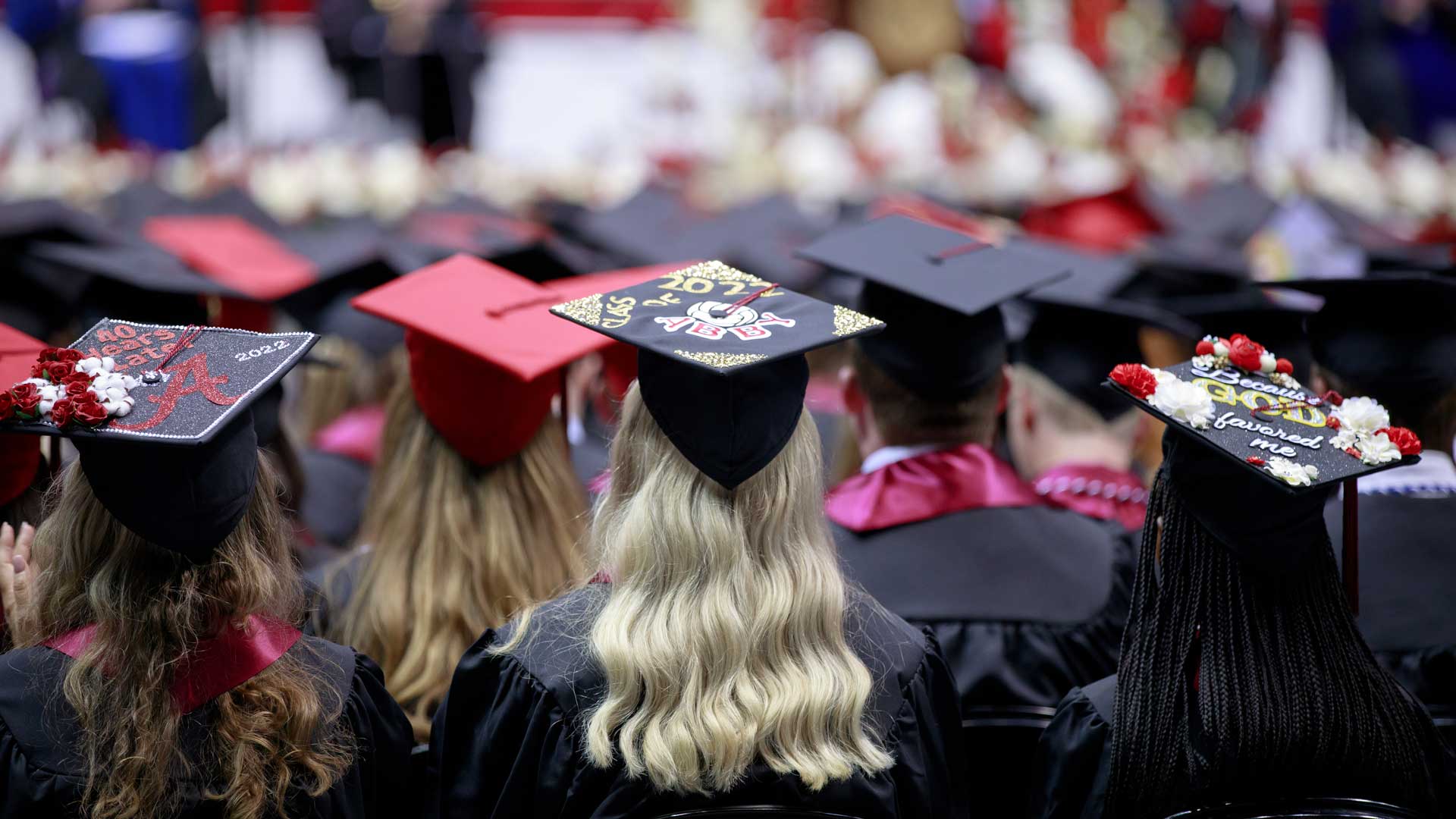 Graduation caps are shown.