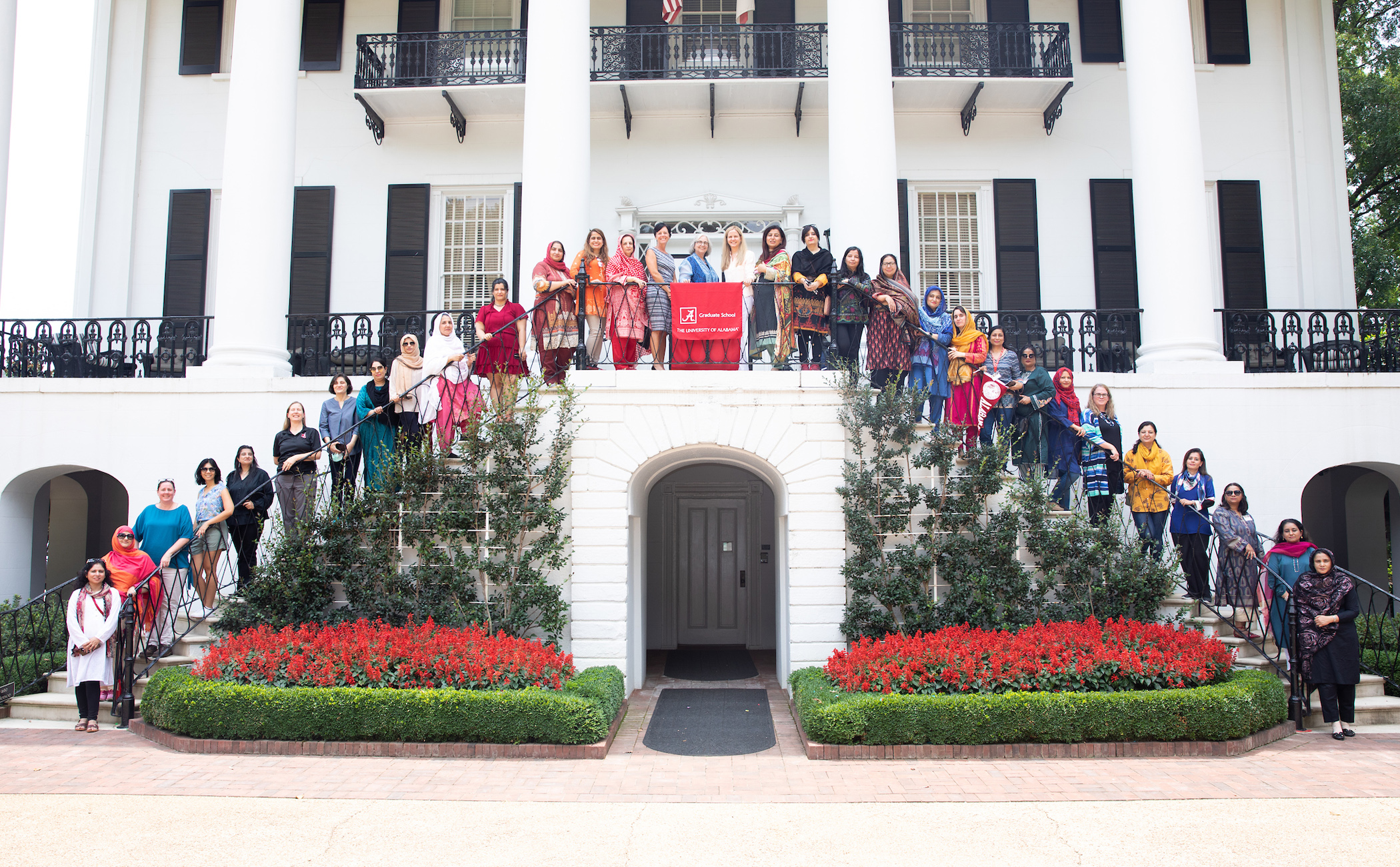 The exchange program participants on the steps of the President's Mansion