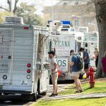 Food trucks line up outside Gorgas Library.