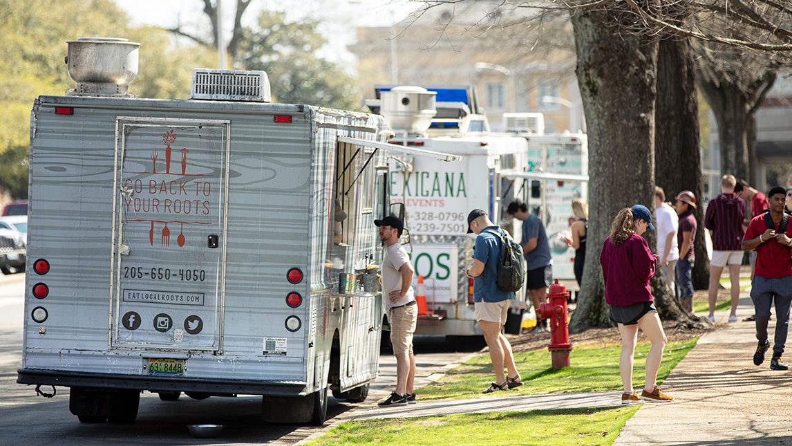 Food trucks line up outside Gorgas Library.