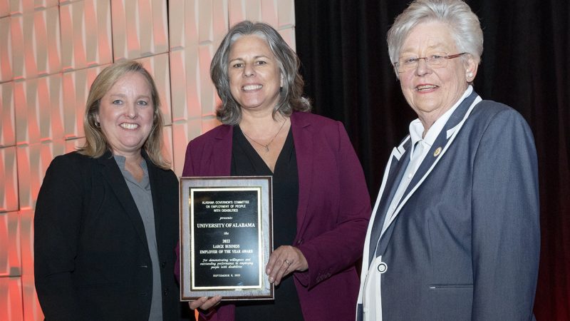 Jane Elizabeth Burdeshaw, Jaime Mitchell and Governor Kay Ivey pictured during an awards ceremony