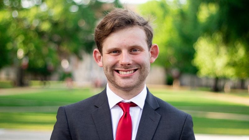 A headshot of Sean Atchison