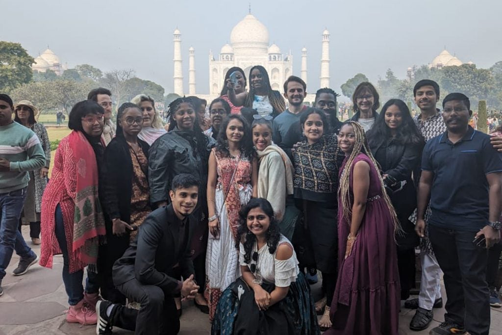 Participants posting in front of the Taj Mahal