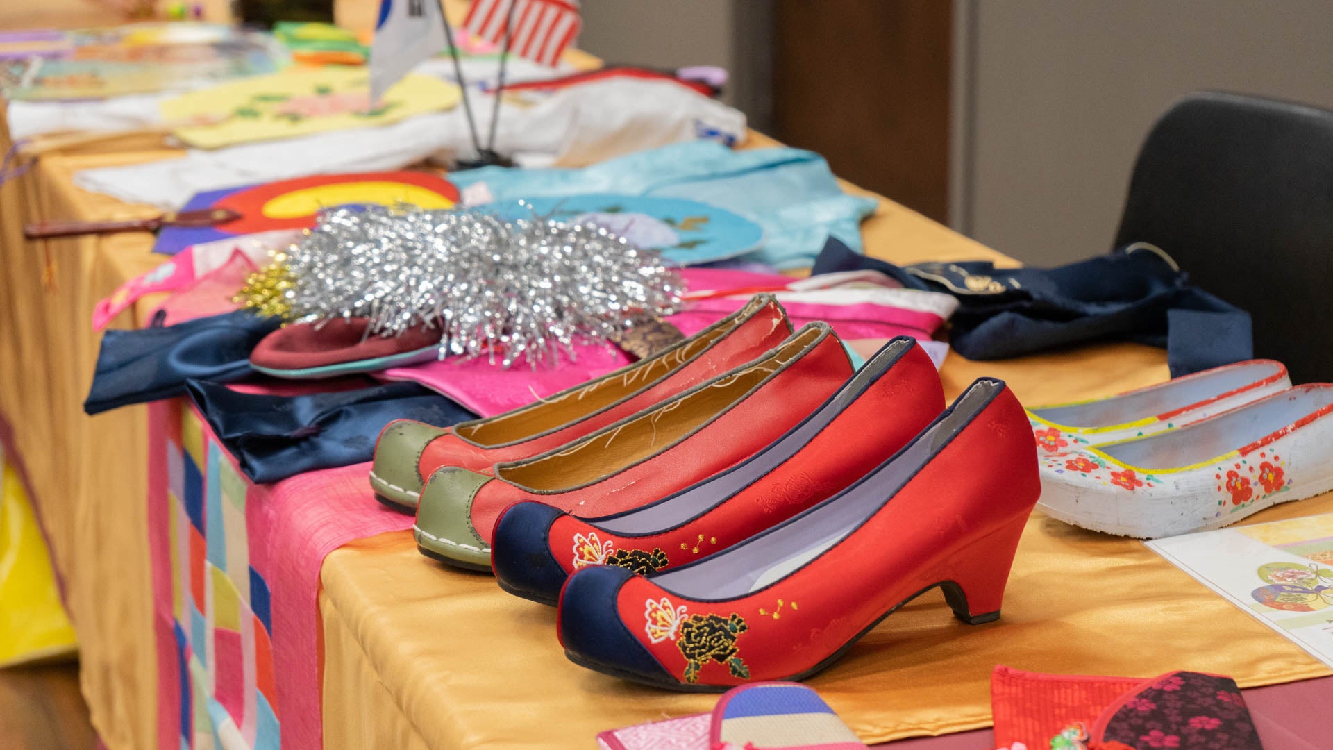 a pair of traditional shoes on a table