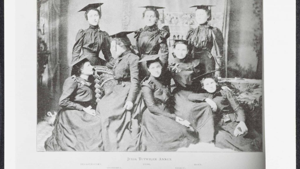 8 women in long dresses and mortarboard, circa 1900, Courtesy of The University of Alabama Libraries Special Collections.