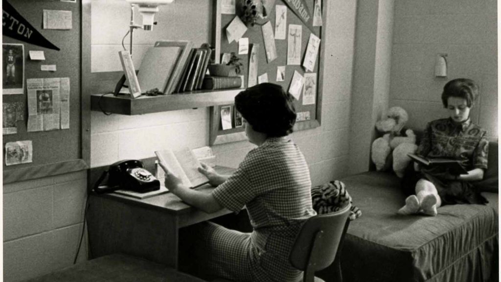 Two women in dorm room. Courtesy of The University of Alabama Libraries Special Collections.