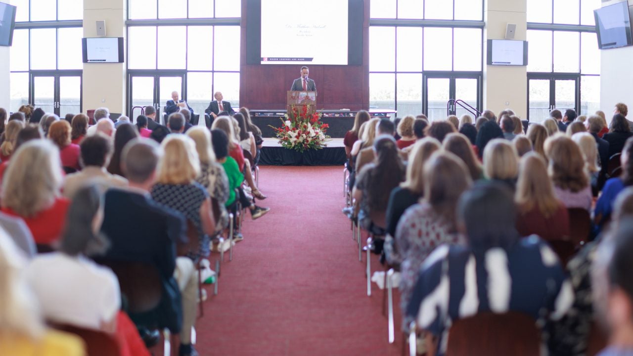 a view down the aisle of the campus assembly event