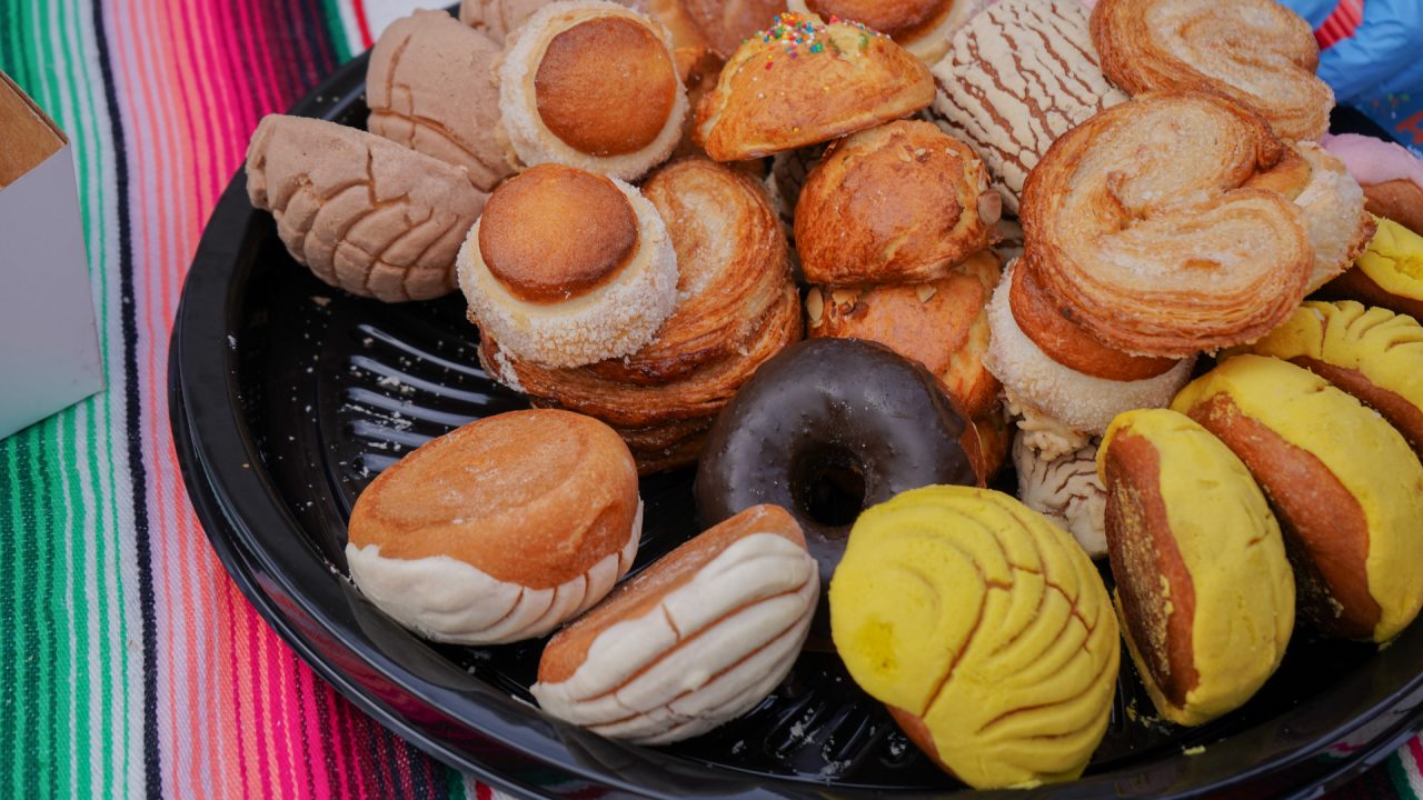 a plate of assorted Latin pastries