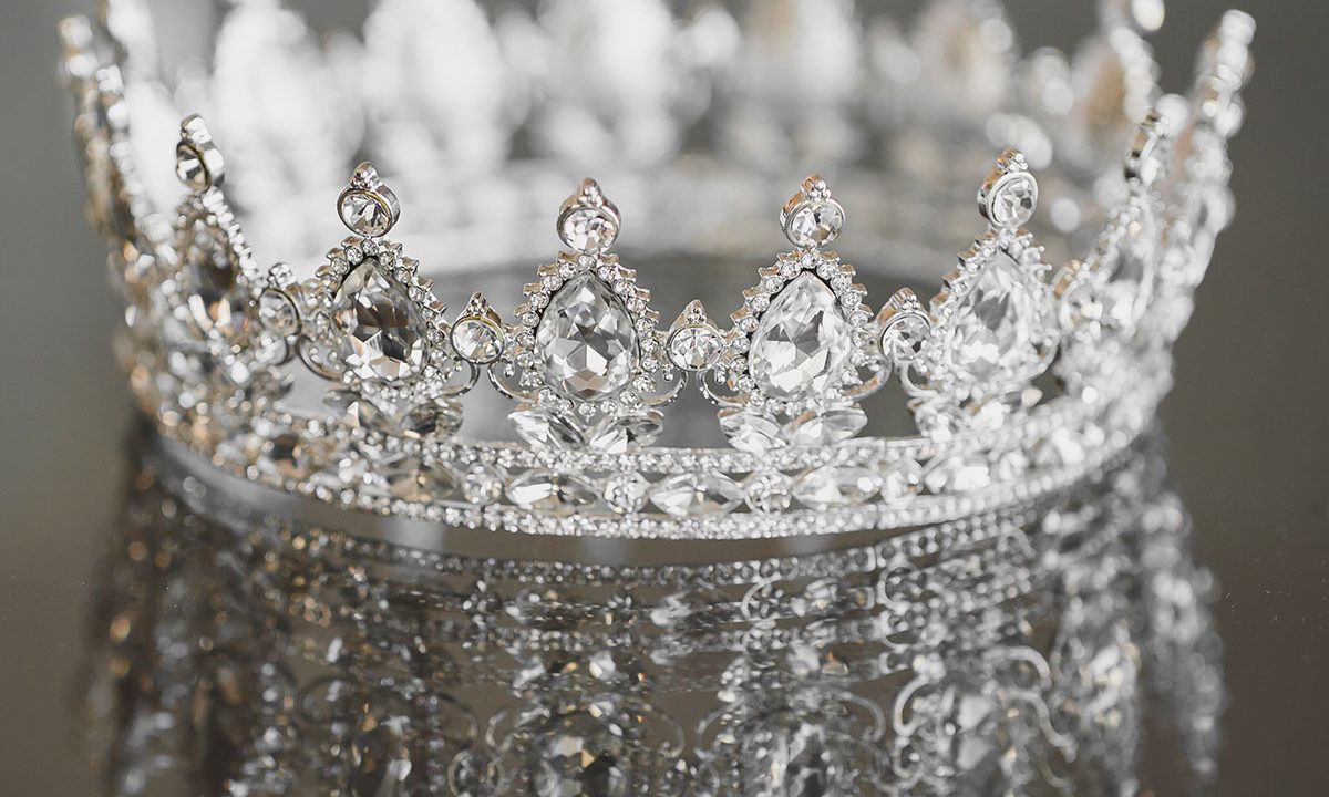 A single tiered bejeweled crown.