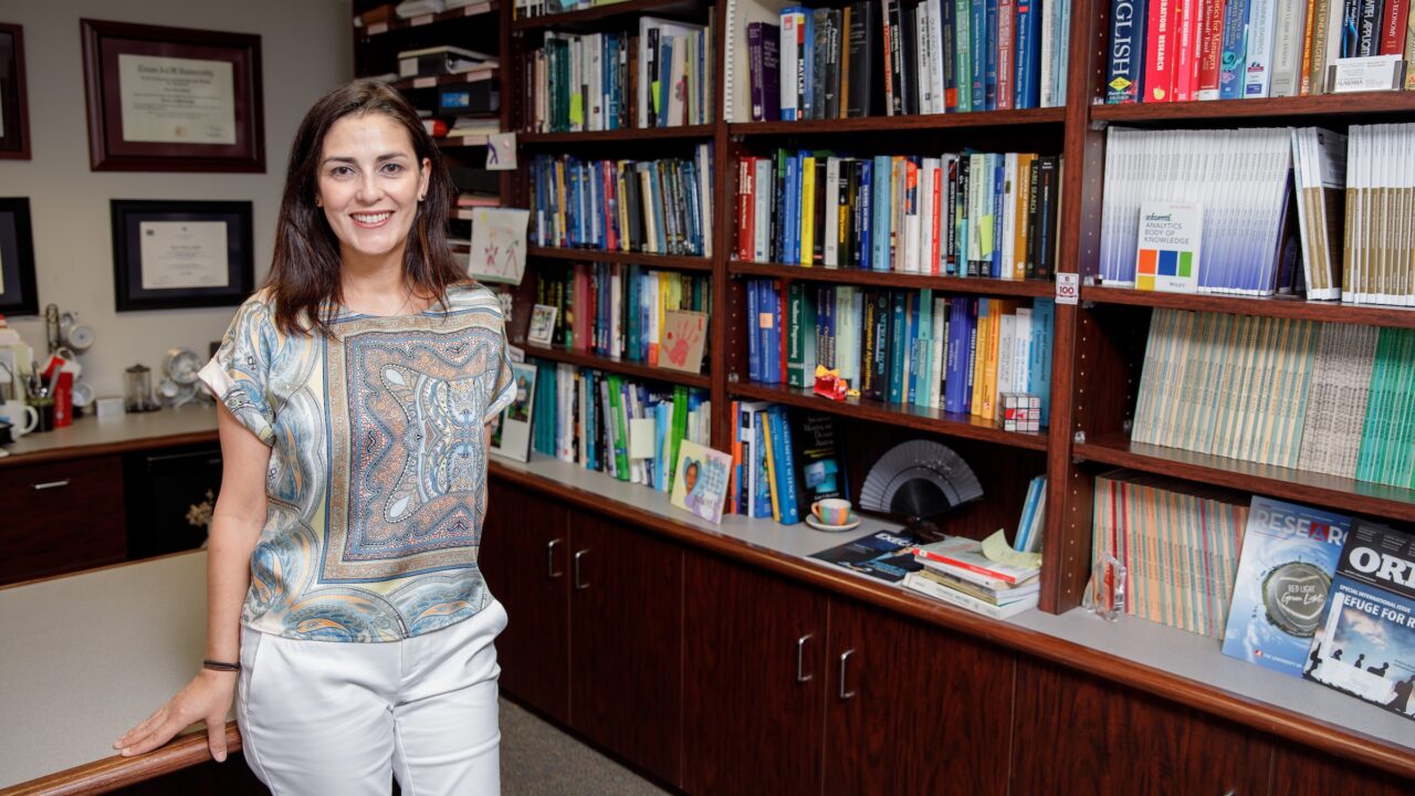 Supply chain and operations management professor and research Dr. Burcu Keskin poses for a photo in her office.
