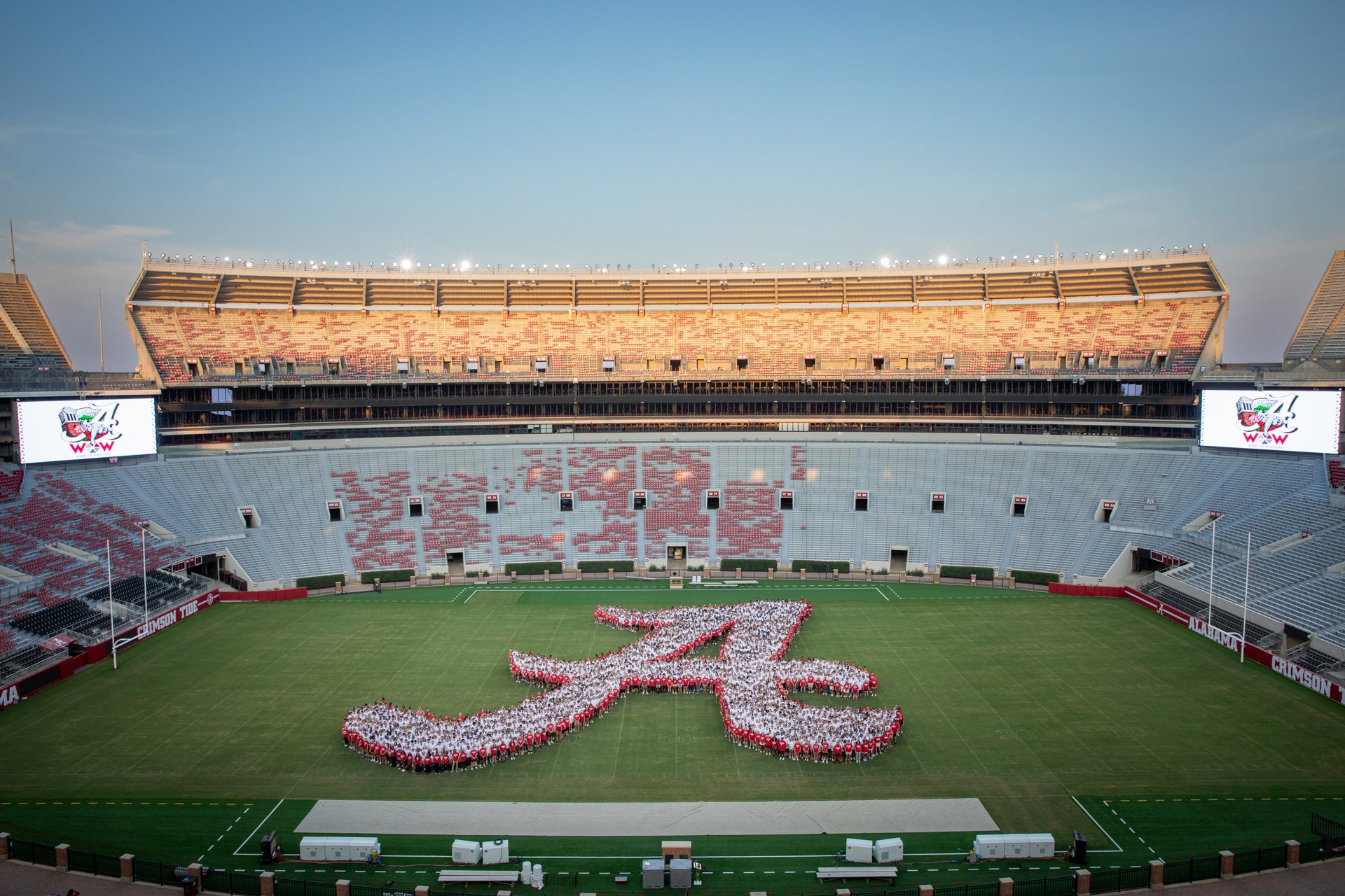 students forming script A in Bryant-Denny Stadium