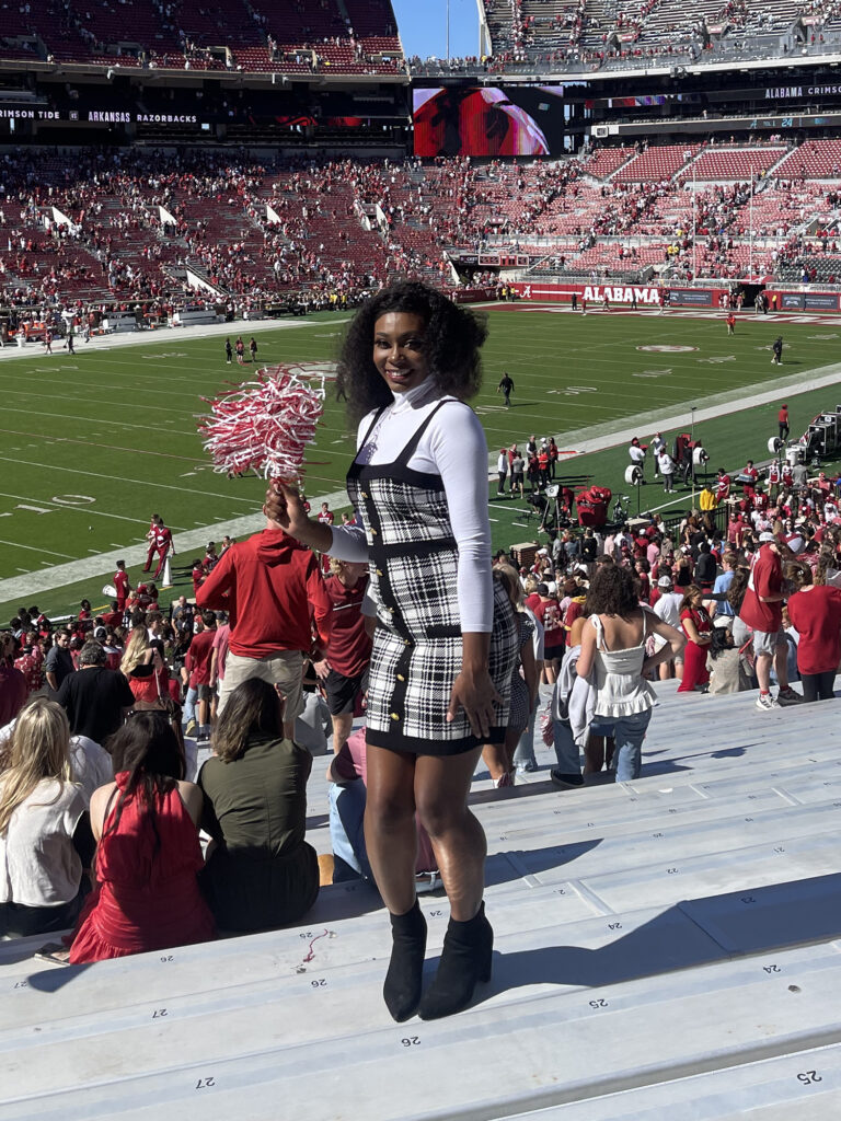 Ursula Lindsey pictured in the stands of an Alabama football game.