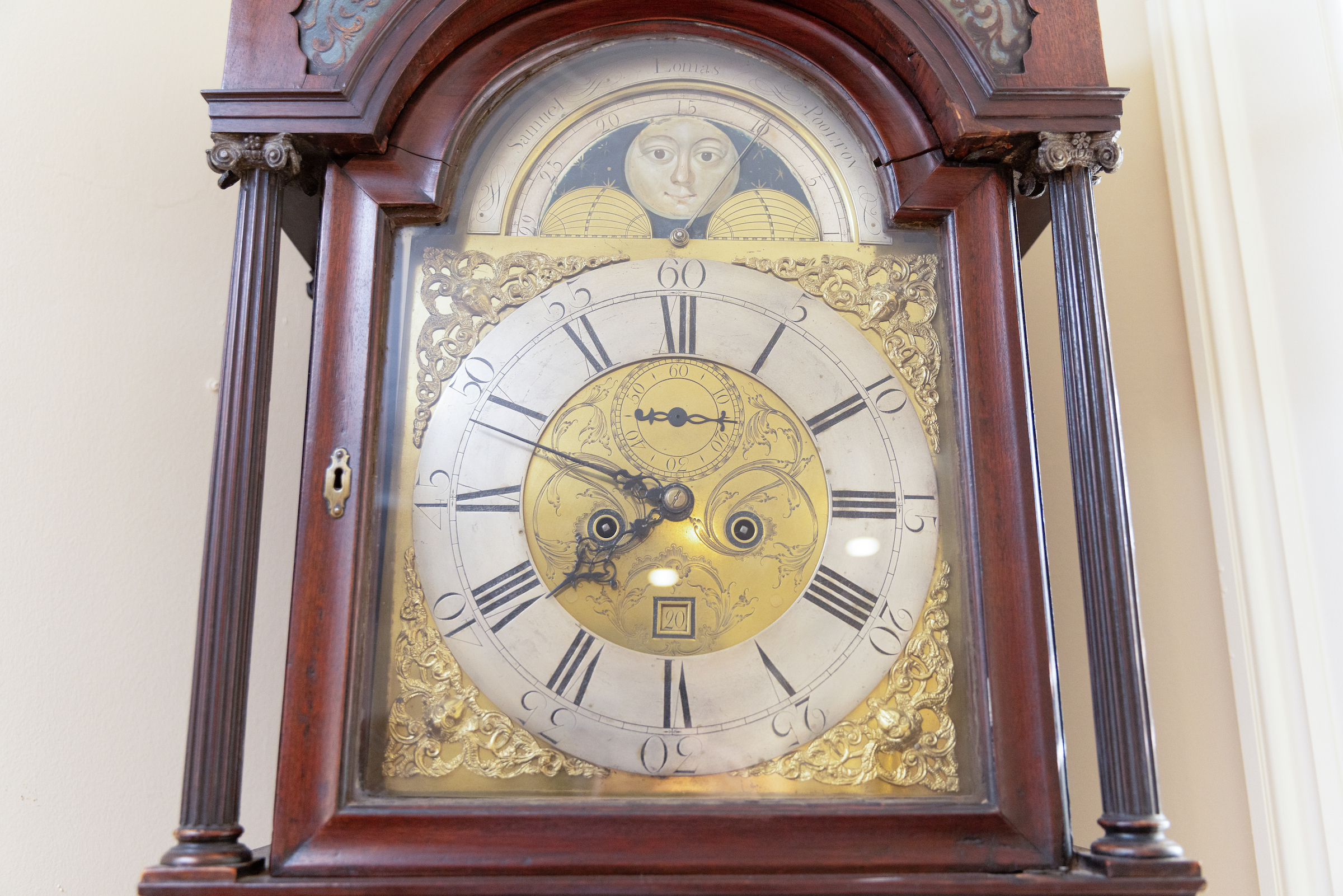 close up of face of president's mansion grandfather clock, one of the two oldest campus clocks