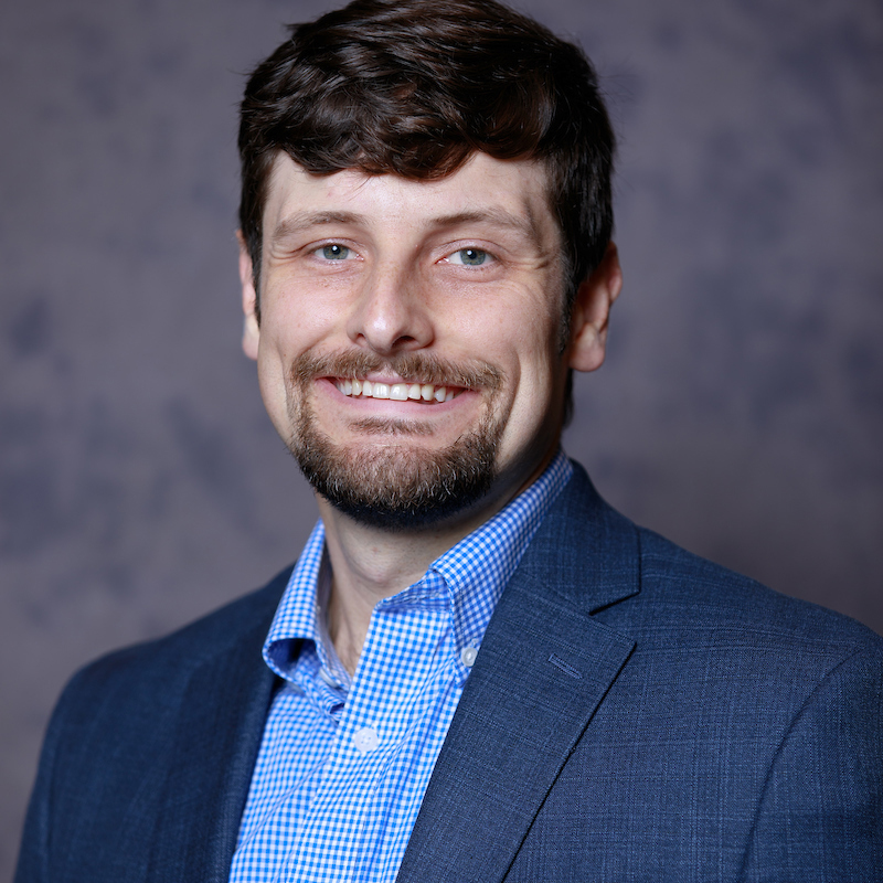 A headshot of James Sheehan