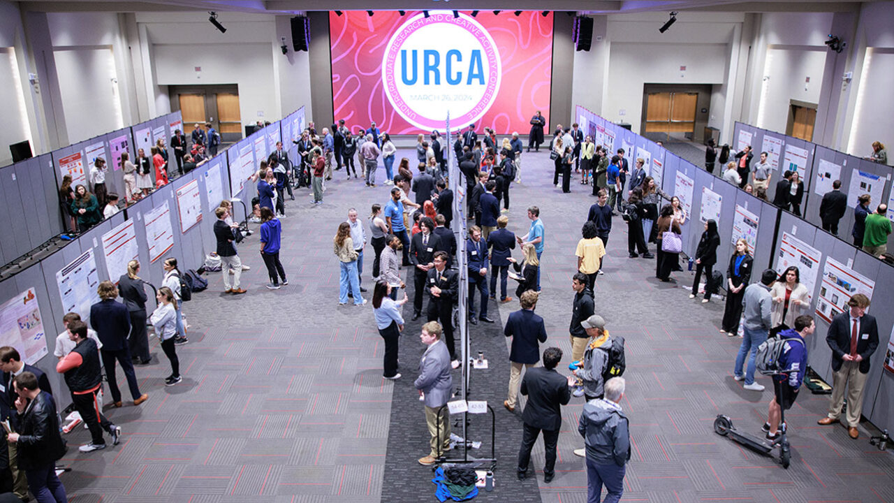 An overhead shot of URCA attendees walking around the Bryant Conference Center.