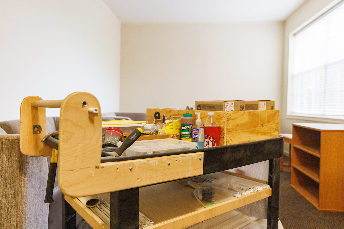 cart of building supplies and tools used in summer housing turnover