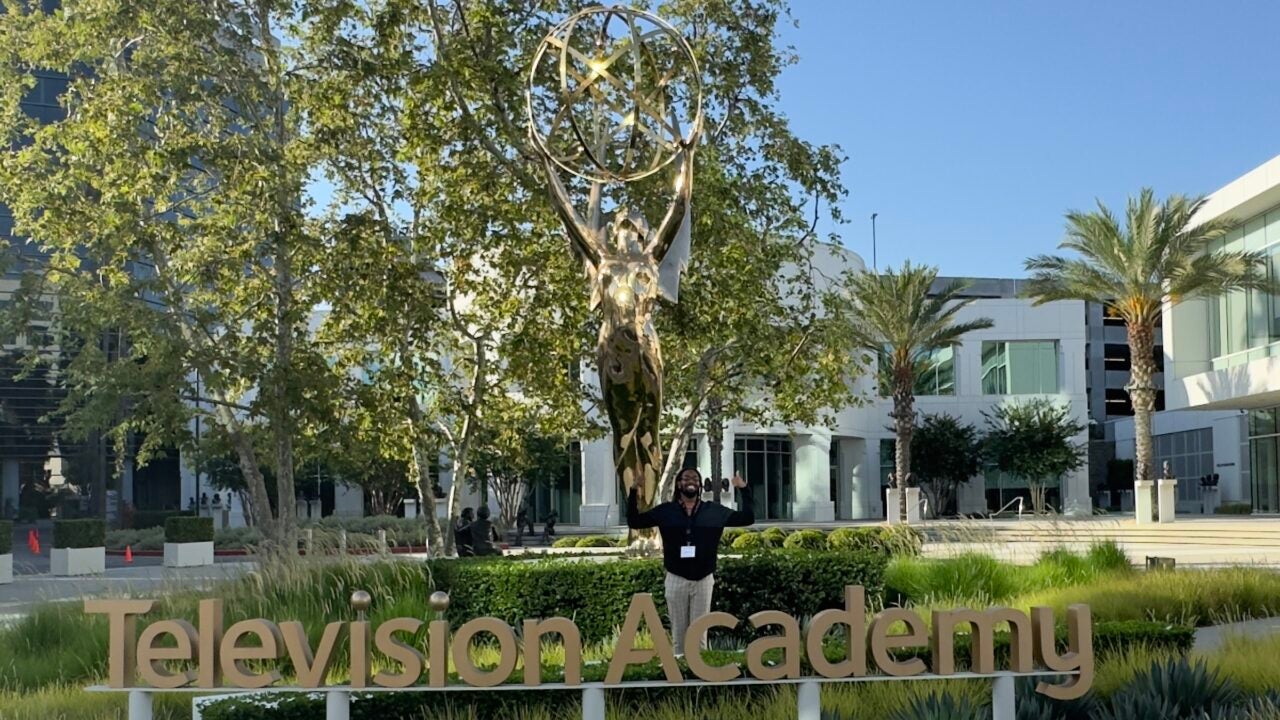 Miykael standing in front of the Television Academy sign