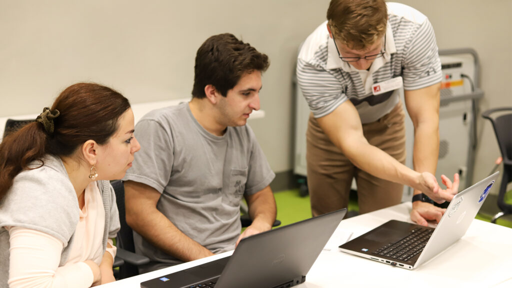 Culverhouse LIFT member teaching a computer class