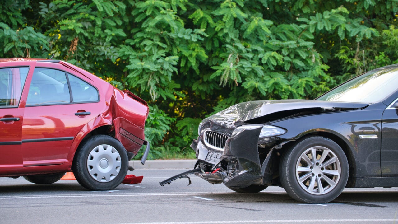 Two cars with damage after a collision