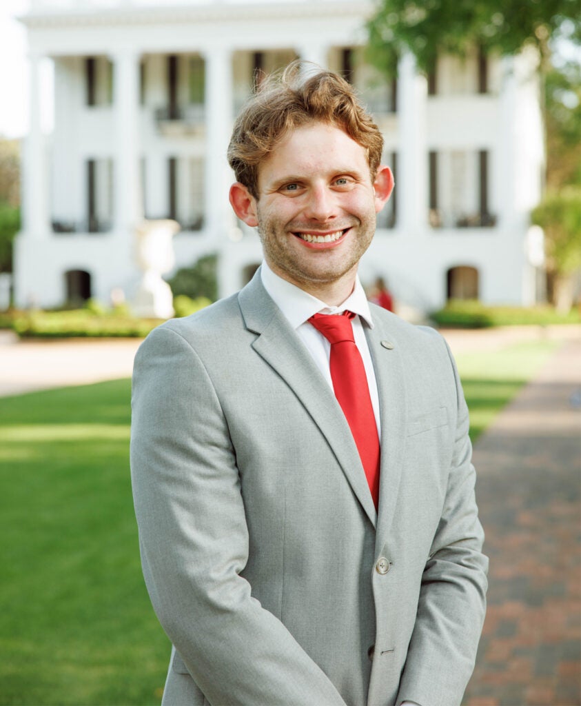 A headshot of Sean Atchison