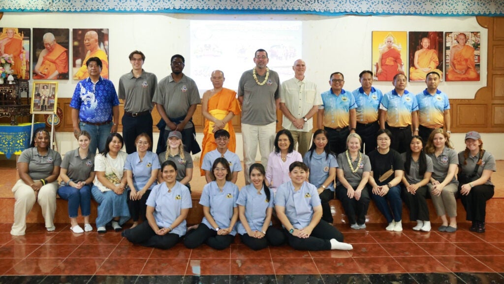 The group of University of Alabama delegates and their hosts