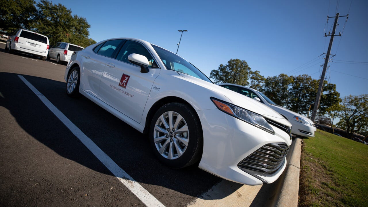 A University of Alabama fleet vehicle in a parking lot