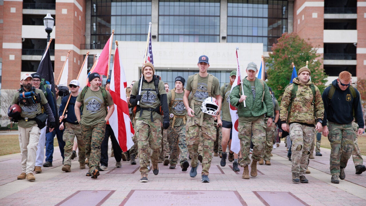 Operation Iron Ruck participants start the march in Tuscaloosa last year